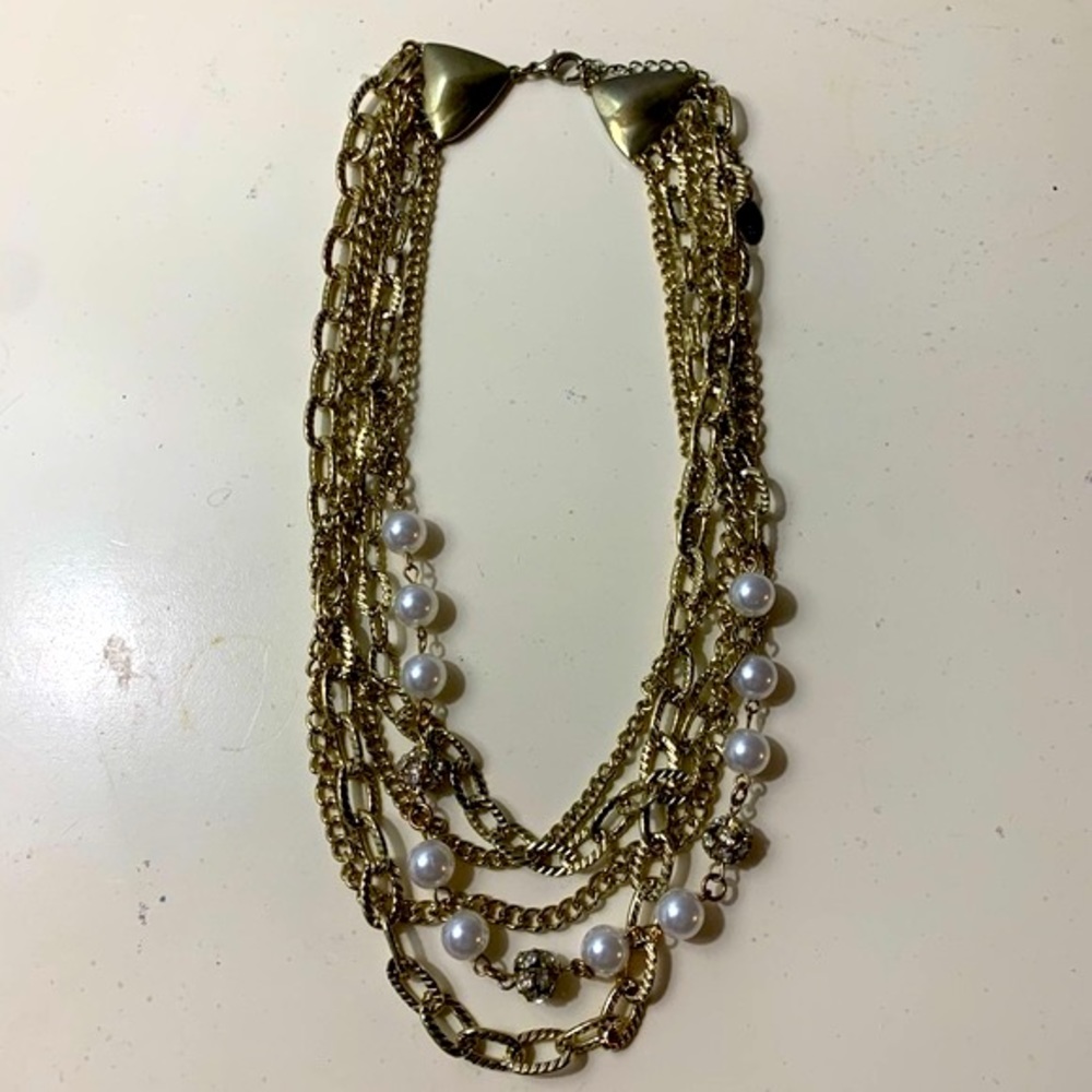 multilayered gold chain and layered necklace
